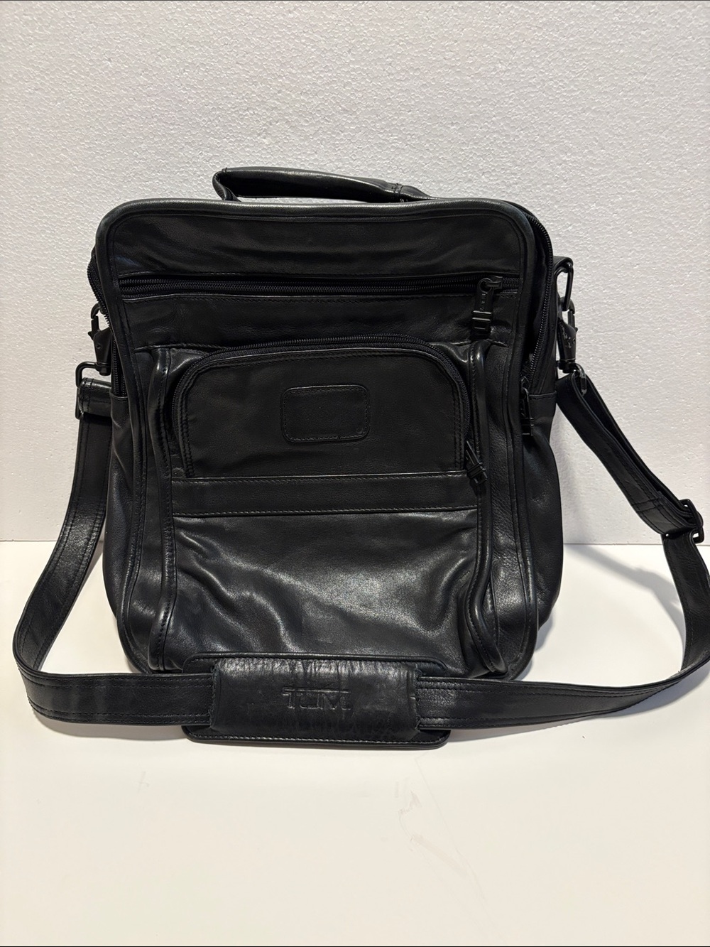 Tumi Black Laptop Backpack with Red Logo Accent